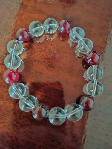Pulseira de Quartzo com Granada, com pedras de 15mm e 12 esferas.