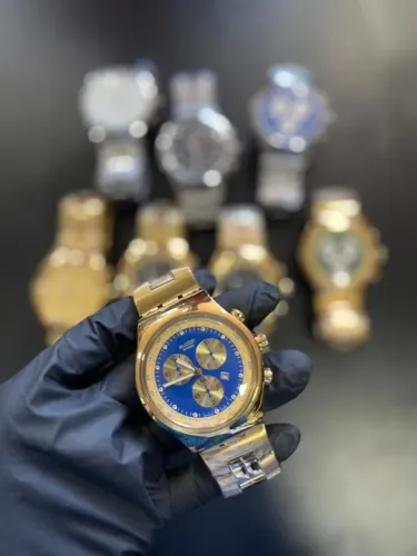 Relógio Swatch série ouro