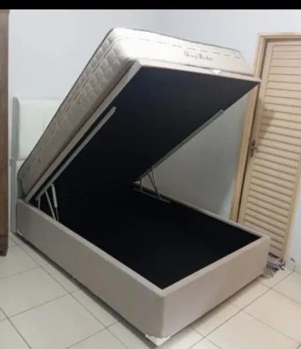 Cama baú na cor bege com colchão confortável