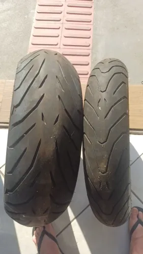 Par de pneus 180/55 e 120/70 Angel St novo