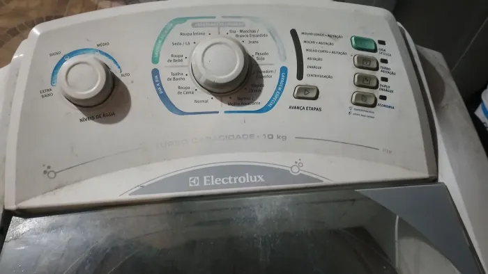 Máquina de lavar roupa usada