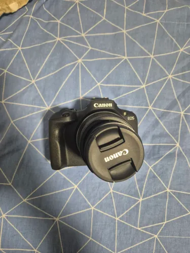 CÂMERA CANON R100 