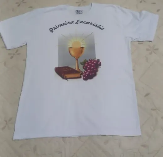 Camiseta tamanho 14 Primeira Eucaristia usada.