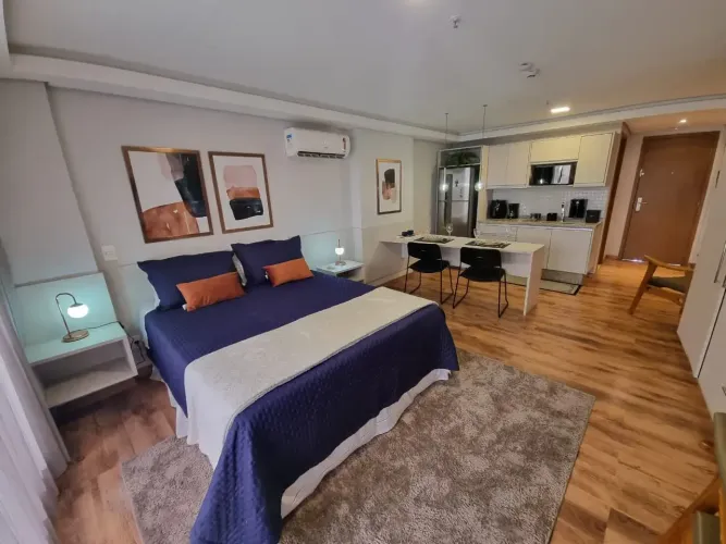 Flat Suíte Confortável com Cama Queen e Cozinha Americana