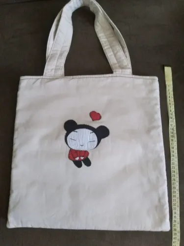 Bolsa Pucca de tecido bege (com botões de pressão)