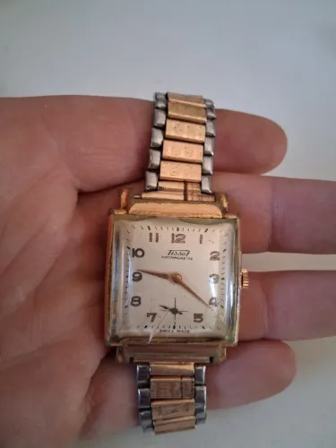 Antigo relógio Tissot masculino à corda