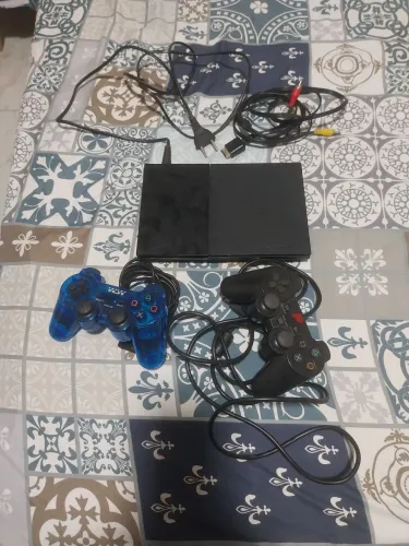 Playstation 2 com defeito. 