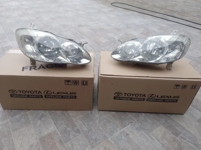 Par de farol original Corolla 2002 ao 2008