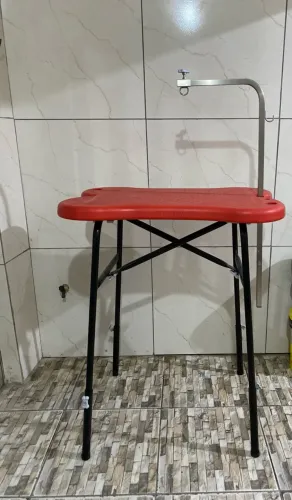 Vendo essa mesa de tosa.Nova