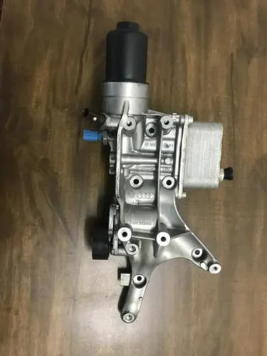 Suporte do compressor e filtro de óleo novo fusca tigua jetta 2014