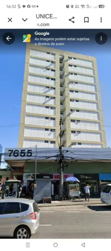 Sala comercial com mobília e ar condicionado