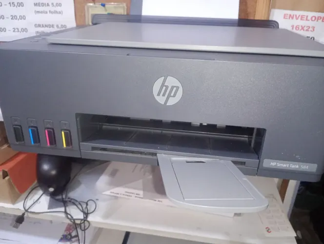 impressora ho s/nova  hp Smart tank 584 so esta faltando cabeca de impressao valor R$ 500.
