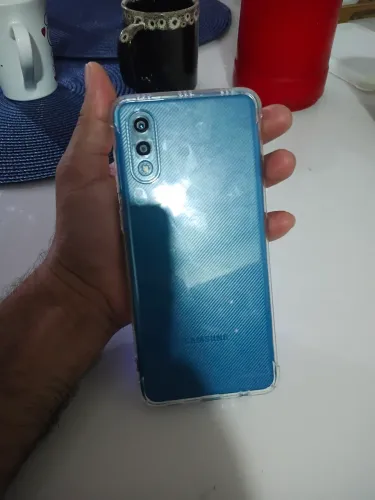 Celular A02 Azul, com capa transparente