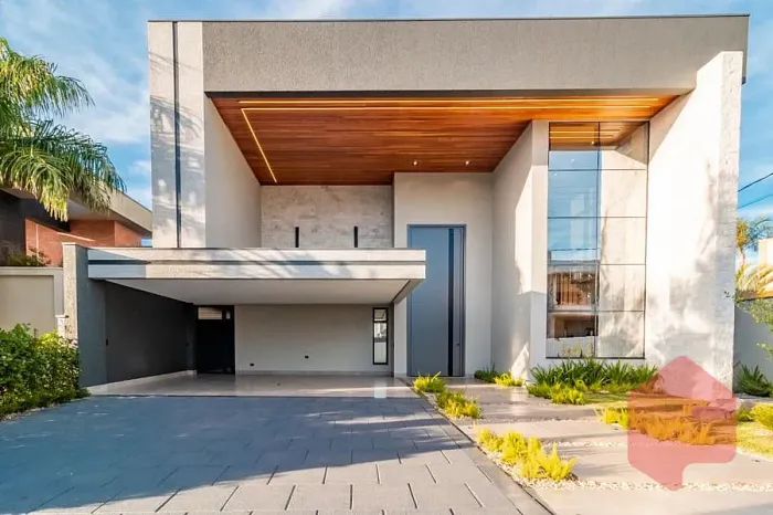 Sobrado em condominio fechado com 4 suítes e piscina.