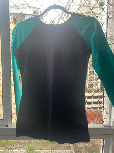 Blusa de surfista