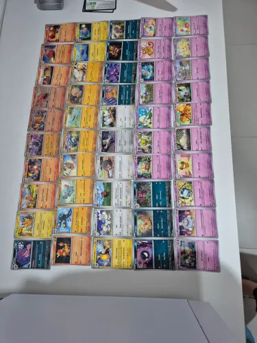 55 cartas Pokemon COPAG ORINAL. 50 pokemons sem repetir e 5 cartas treinador