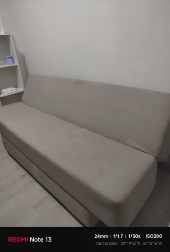 Sofá-cama bege em bom estado 
