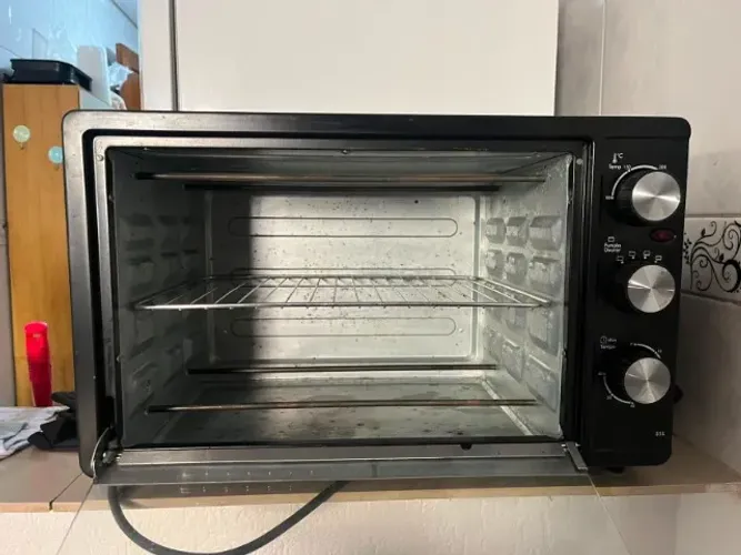 Forno elétrico britânia 35 litros $200