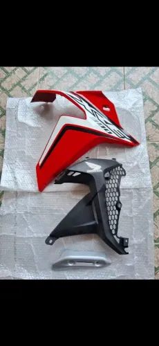 Peças de moto honda nova original lado direito , na embalagem hally 2020.