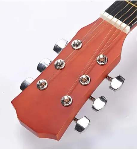 vendo violão madeira maciça de cor bege e vermelho  cordas de aço 