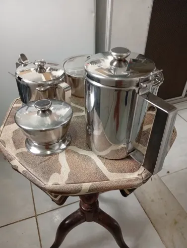 Vendo jogo de chá e Café, Inox com 9 peças.