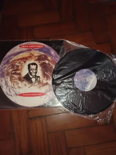 Disco de vinil the best of Louis Armstrong conservado lavado plásticos novos 