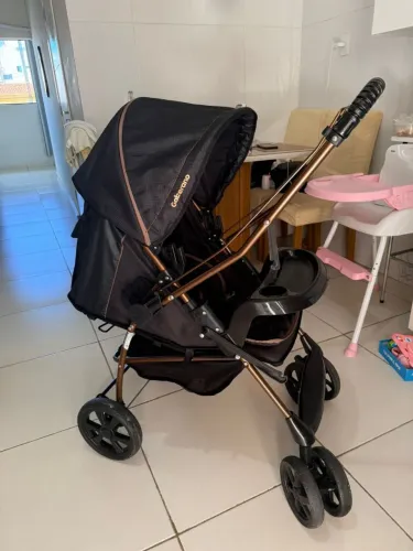 Estou vendendo esse carrinho de bebê ainda tem conversa