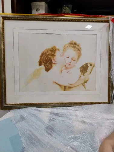 Reprodução emoldurada da obra "First Kiss" do pintor francês William  Bourguereau