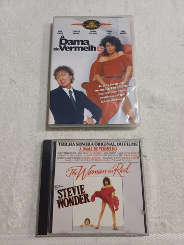 Dvd do filme a Dama de vermelho e o CD com a trilha sonora