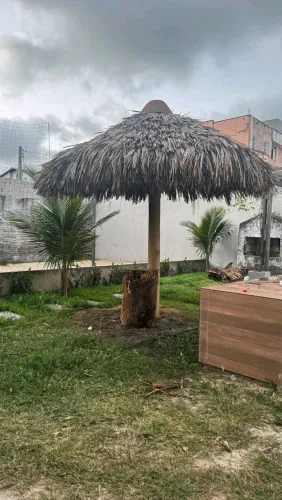 Cobertura de palhas e Madeiramentos