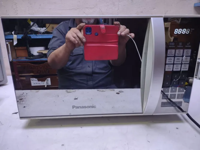 Micro-ondas espelhado Panasonic 25 litros 220 volts funcionando perfeitamente e conservado