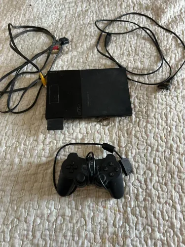 PlayStation 2 com vários jogos