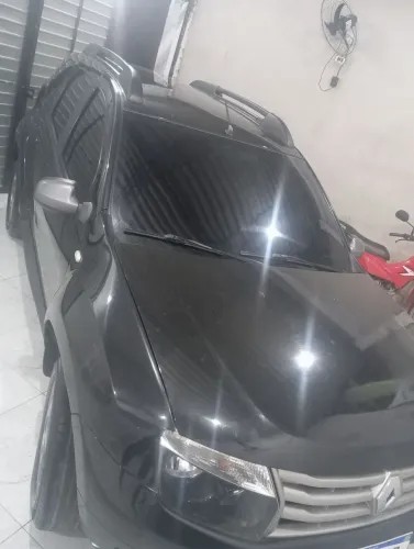 Duster 2015 pago 2026, faço troca também com carro pago 2026