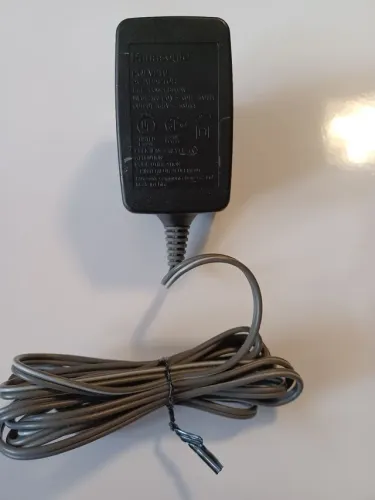 Adaptador Panasonic PQWATC1468LB. Descrição: Input 110V ~ 60Hz 50uA. Output 9V --- 200uA