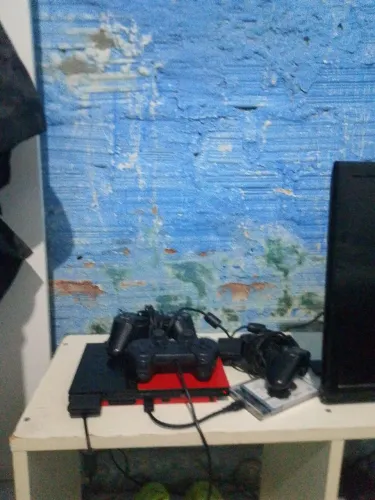 Playstation 2 slim acompanhado com controle original e HD com 320 jogos aceito trocas