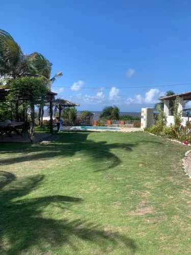 Lindo terreno com vista ao mar e a Laguna Guarairas, com casa e comércio