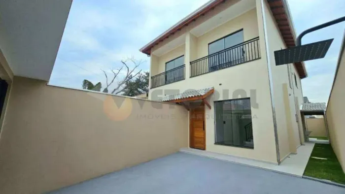 Sobrado com 116 m² e 3 dormitórios à venda por R$ 620.000 - Balneário dos Golfinhos - Cara