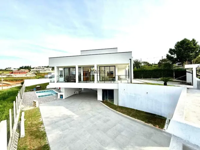 Descubra seu refúgio perfeito em Vargem! Casa para venda no Condomínio Recanto Jaguari - v
