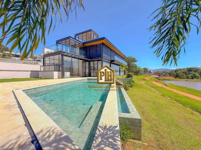 MANSÃO A VENDA CONDOMINIO FIGUEIRA GARDEN - 5 SUITES - VISTA PARA O LAGO