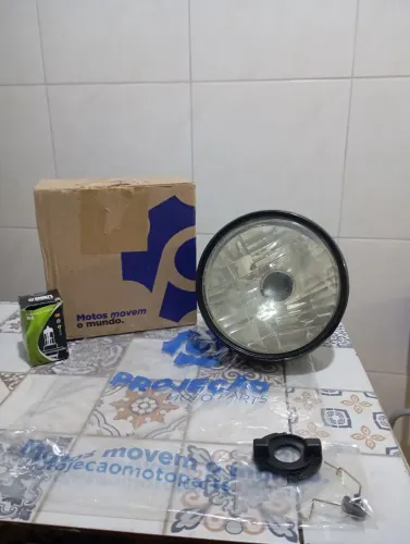 Farol Honda (globo óptico) completo 