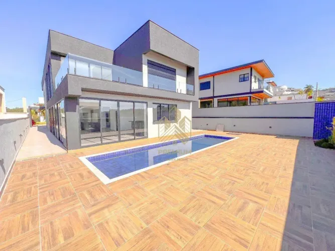 Casa com 4 dormitórios à venda, 377 m² por R$ 3.000.000,00 - Condominio Figueira Garden -