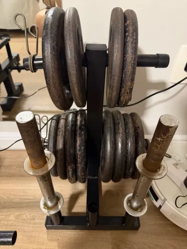 Vendo anilhas de ferro fundido e duas barras de 40 cm. maciças.