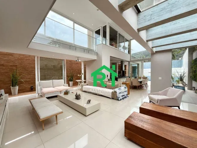 Casa à beira mar com 4 quartos (4 suítes), 2 vagas e lazer em Jardim Guaiuba, Guarujá