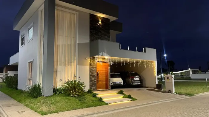 Casa à venda em condomínio fechado em Eldorado do Sul com 3 dormitórios e 2 vagas