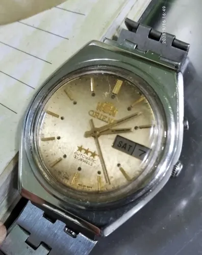 orient automatico marrom claro