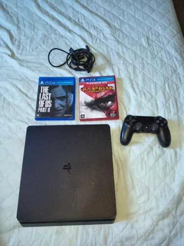 Ps4 slim de um tera byte semi novo nunca foi para conserto de procedência.
