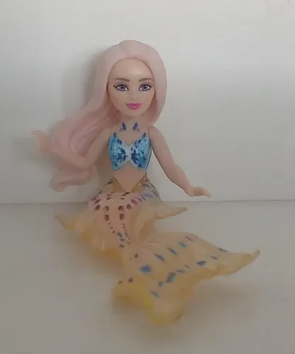 BONECA MINIATURA DISNEY A PEQUENA SEREIA LIVE ACTION CASPIA