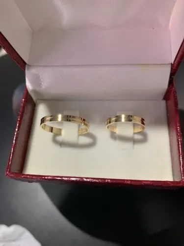 Alianças 04 gramas de ouro 18k 