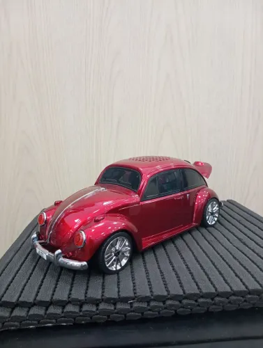 Caixa de som modelo carros