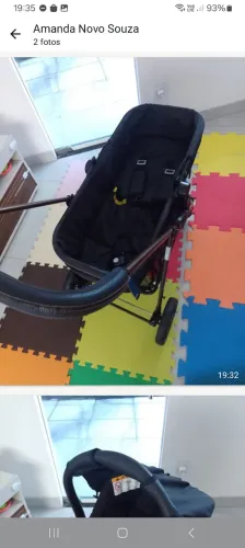 Carrinho de bebê com bebê conforto